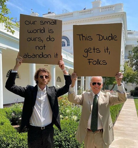 Biden And Dude With Sign 12012023064557